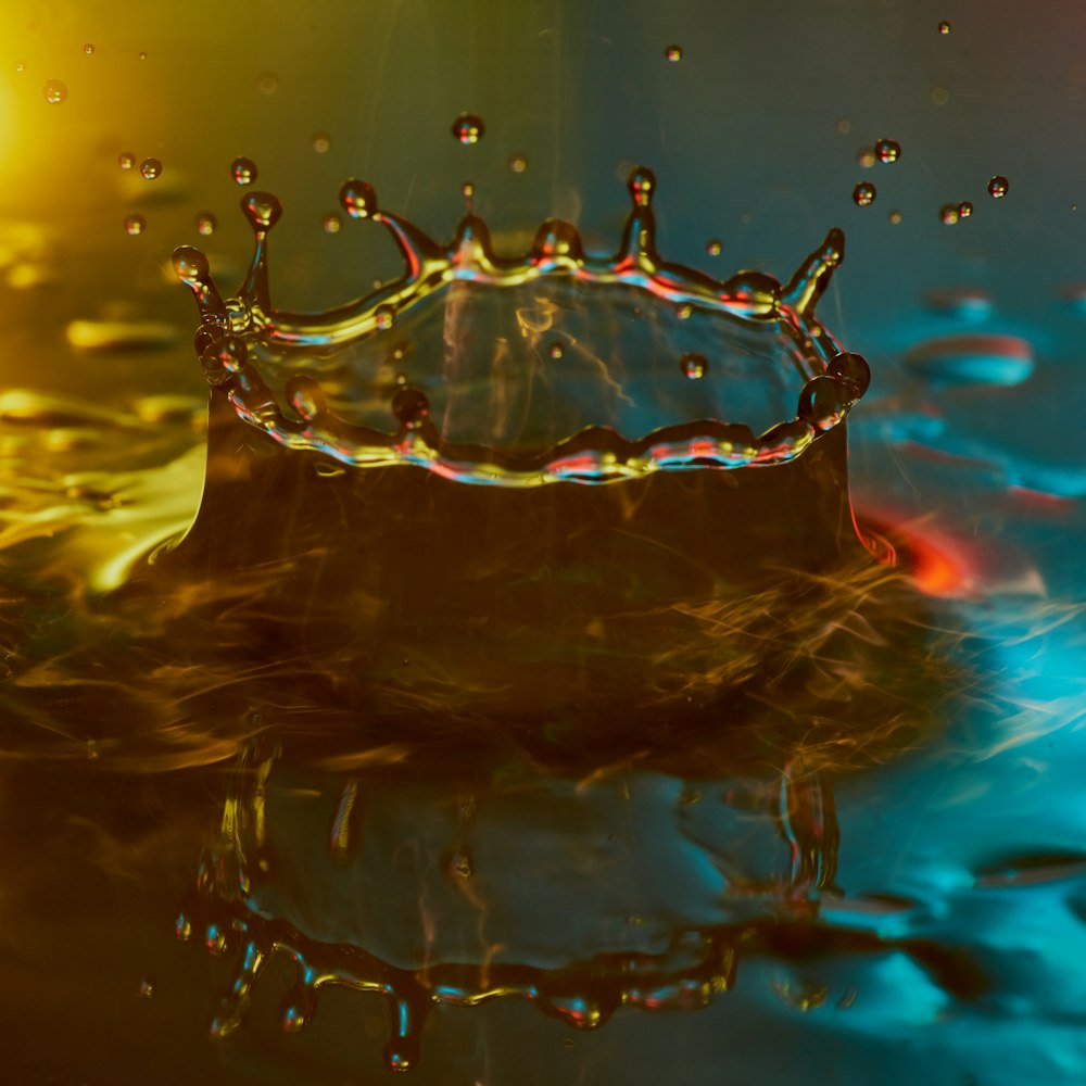 water drop in clear glass container