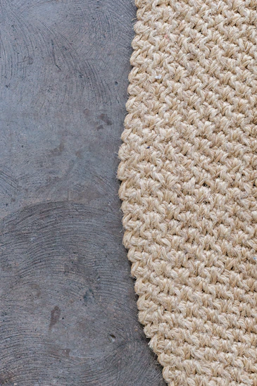 white knit textile on gray textile
