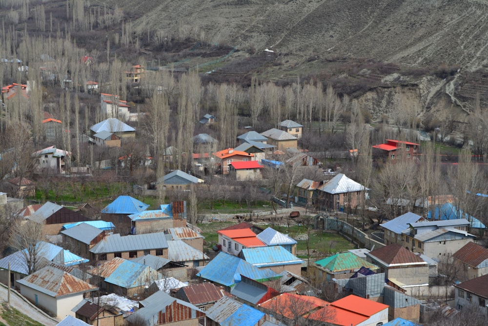 houses near mountain during daytime