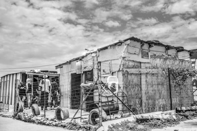 A vintage screenshot capturing the early 2b2t spawn area with players gathering around makeshift structures.