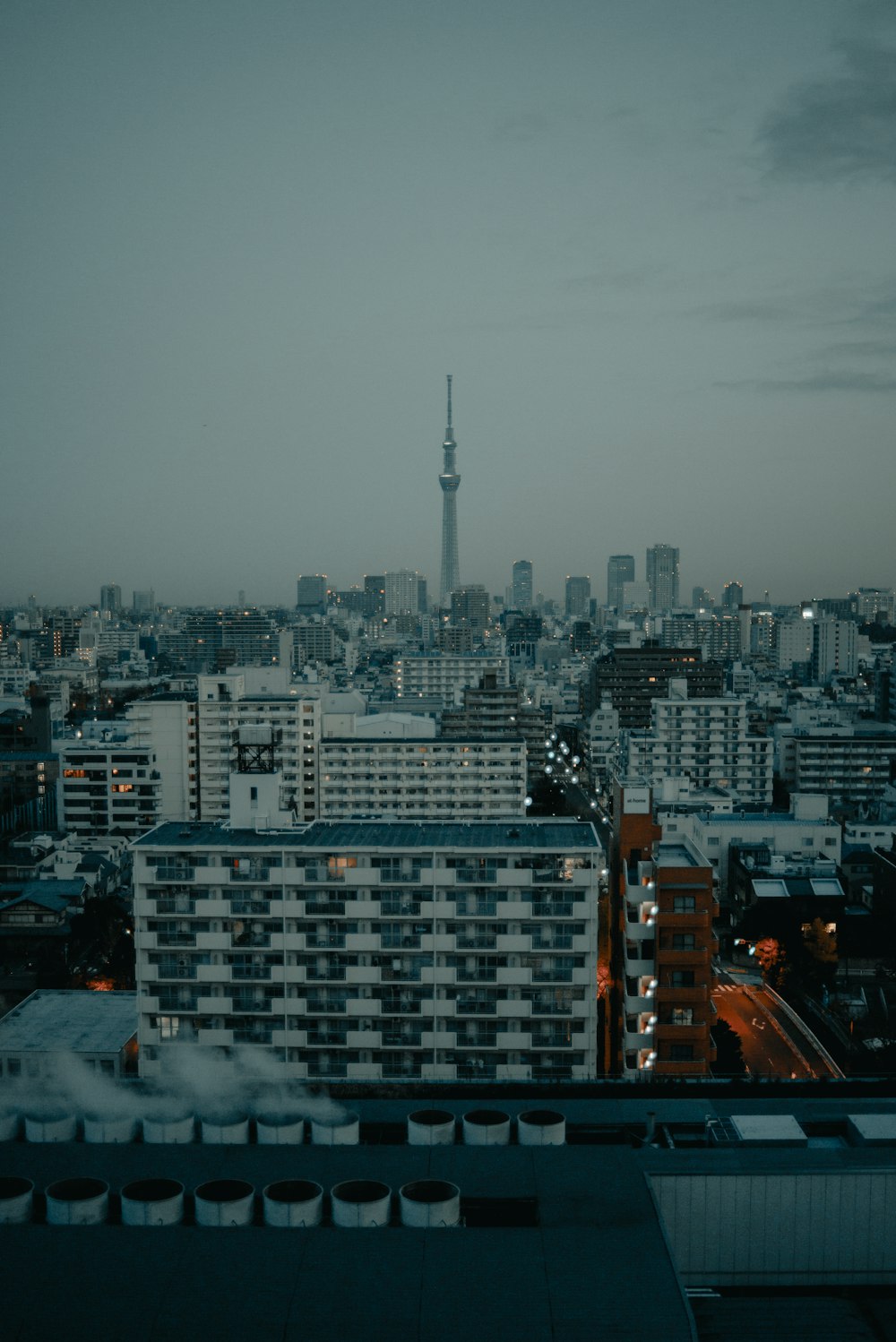 a view of a city with tall buildings