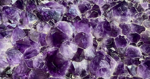 a close up of a bunch of purple rocks