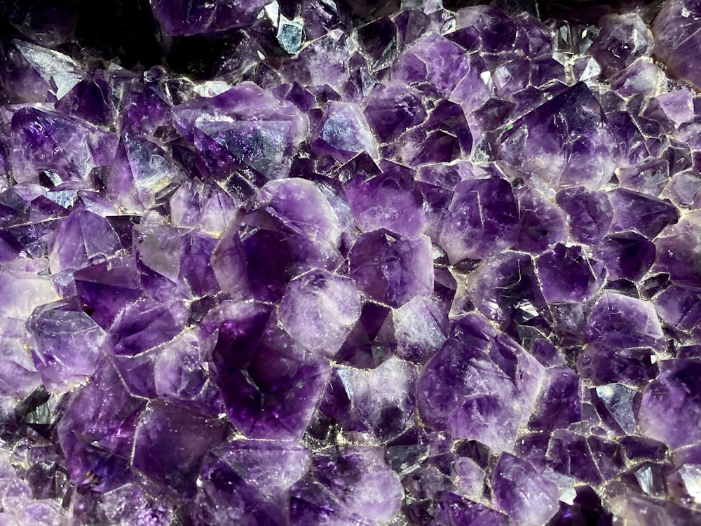 a close up of a bunch of purple rocks