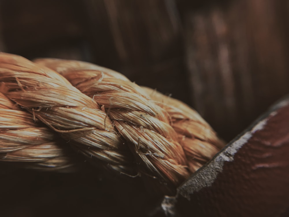 brown rope on brown wooden surface