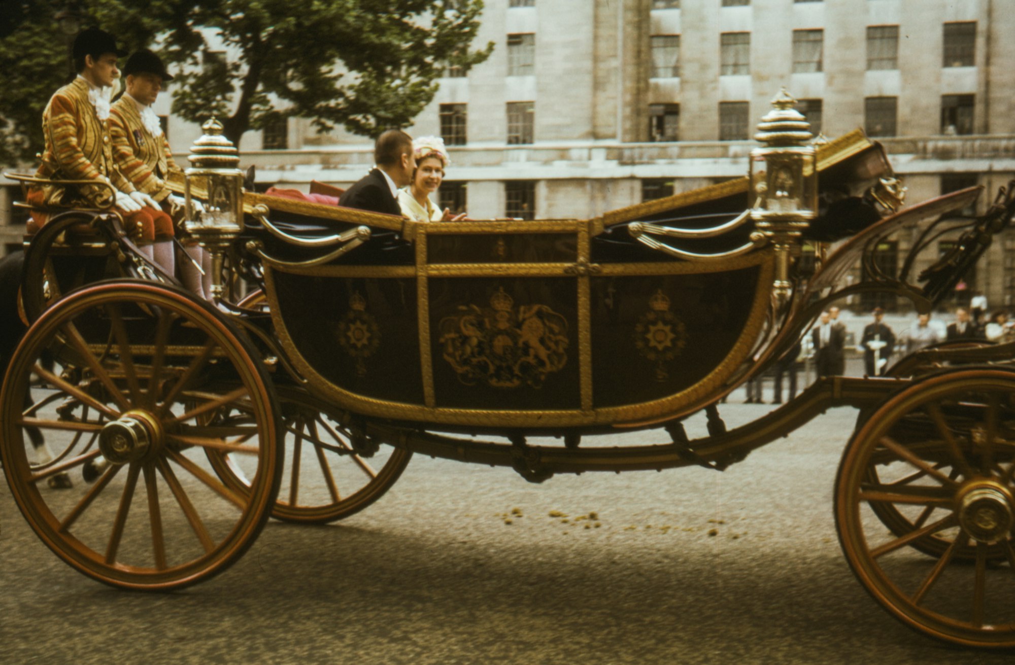 1965, Queen Elizabeth II sits in a carriage during the Opening of Parliament, Queens royal procession