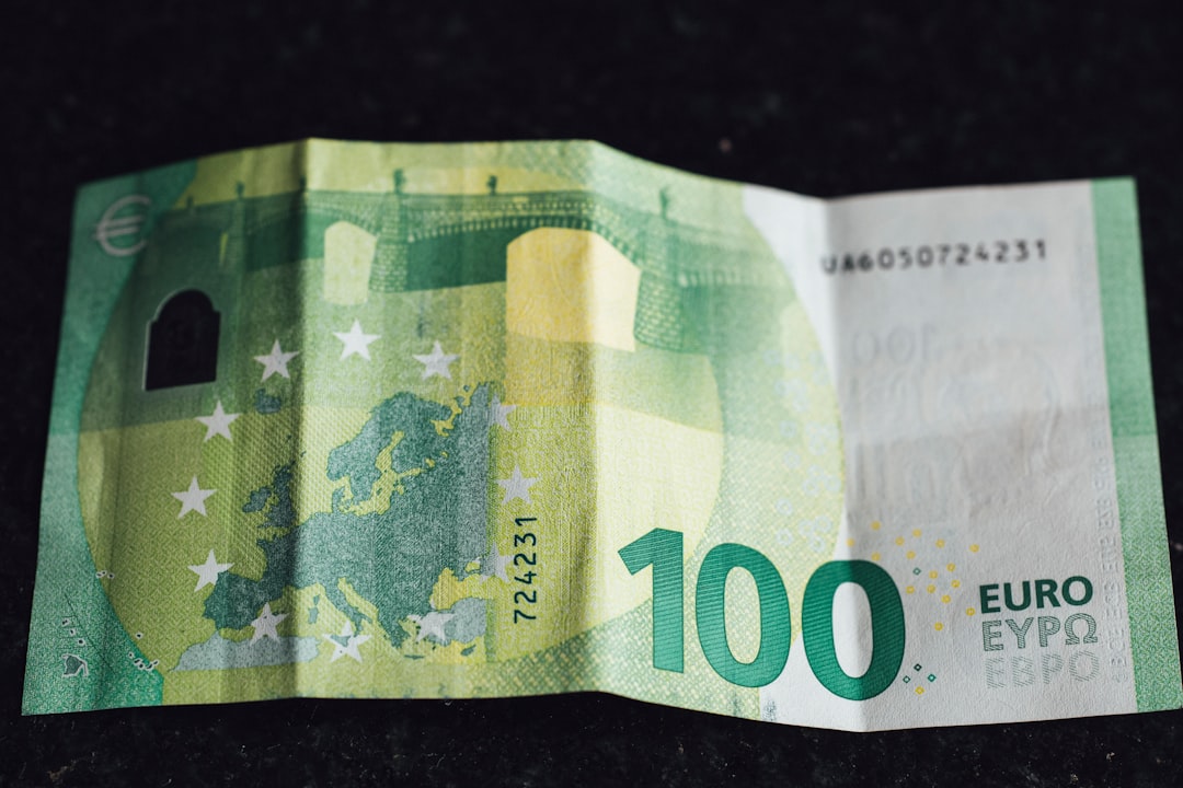 20 euro bill on black surface