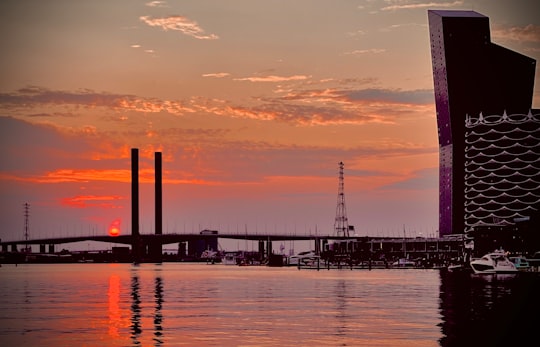 silhouette of people on dock during sunset in Docklands Australia