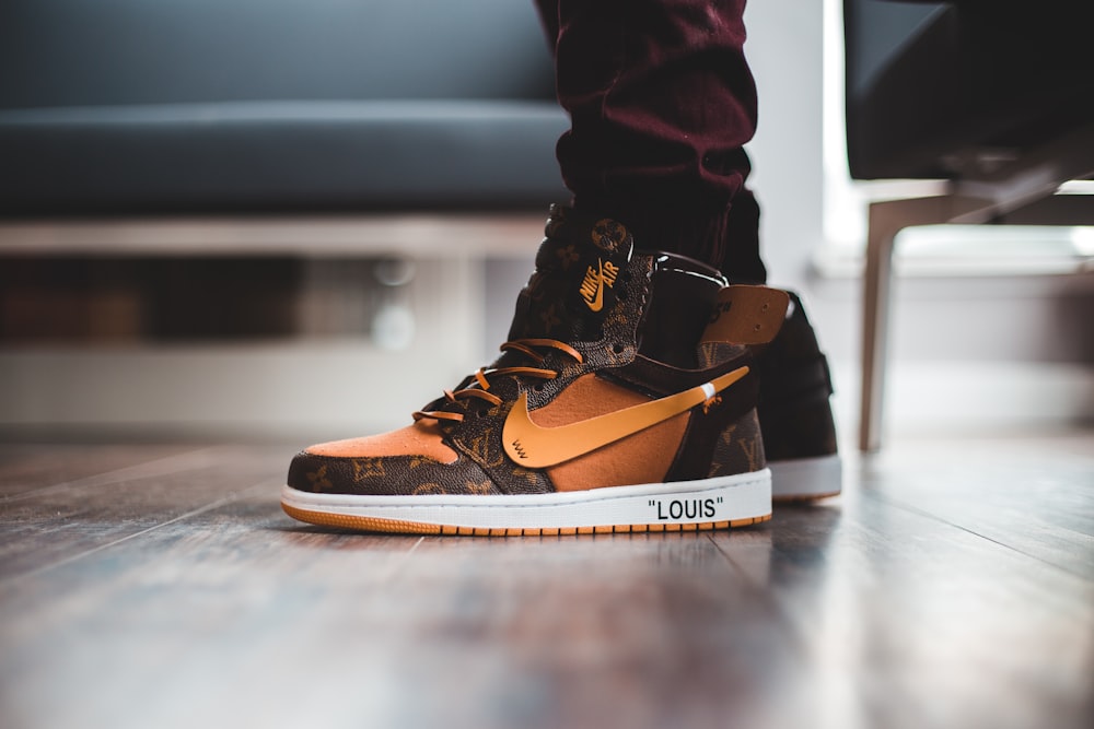Person wearing black and brown nike high top sneakers photo – Free Apparel  Image on Unsplash
