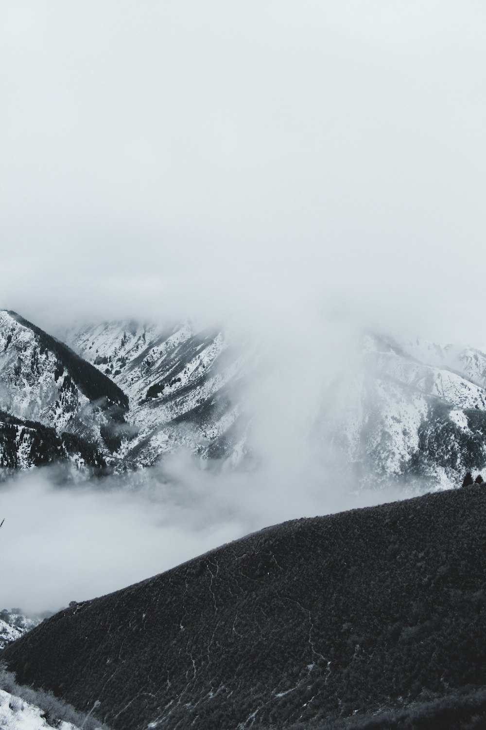 snow covered mountain during daytime