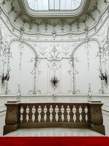 Interior room showcasing elegant ceiling moldings made from plaster.