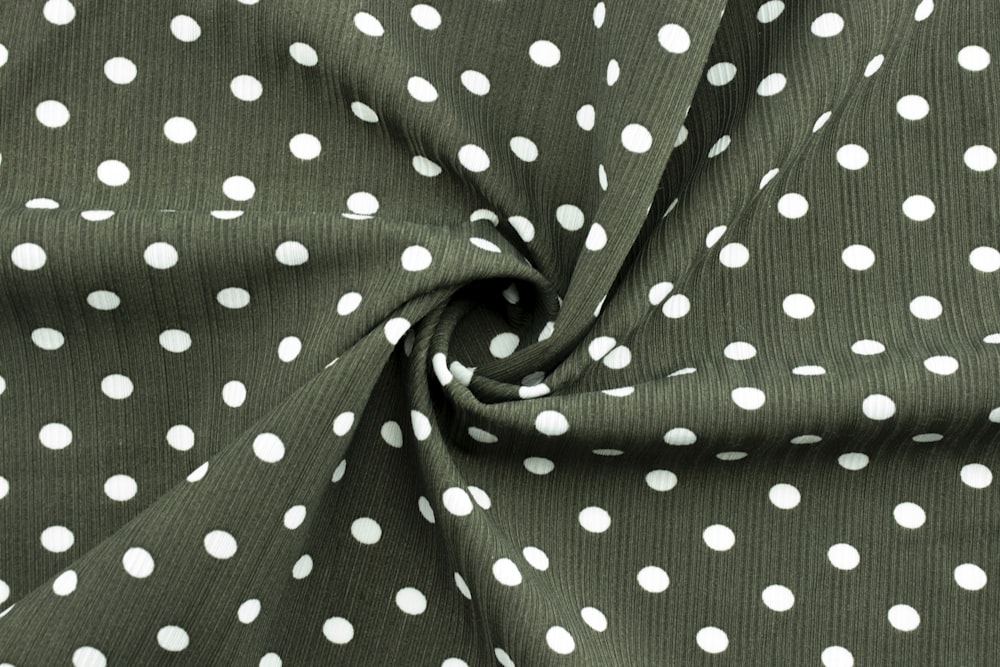 black and white polka dot textile