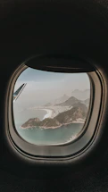 aerial view of lake and mountains during daytime