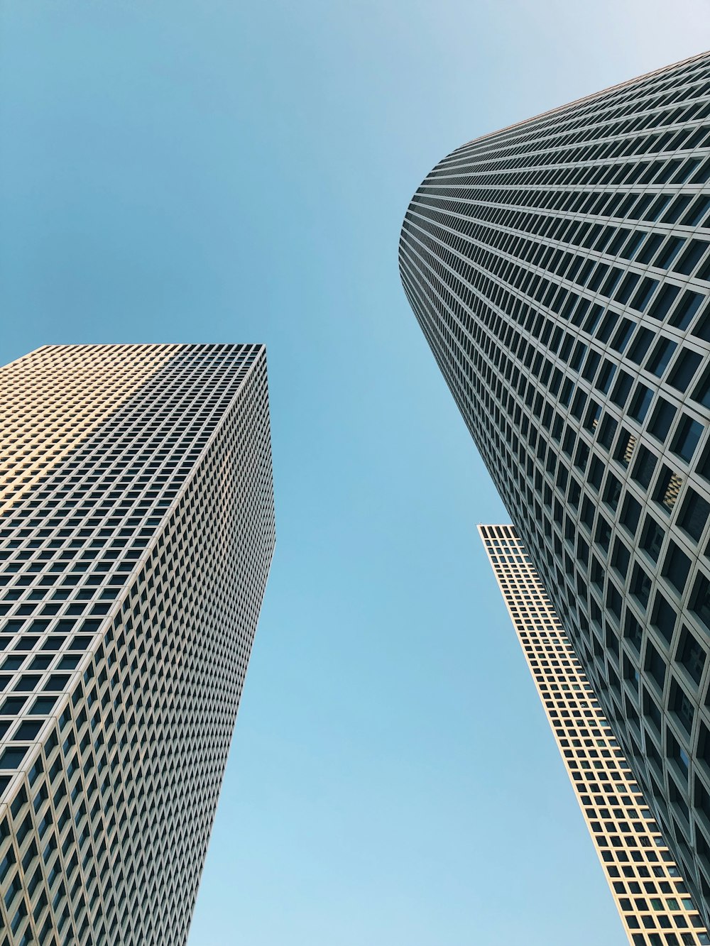 low angle photography of high rise building