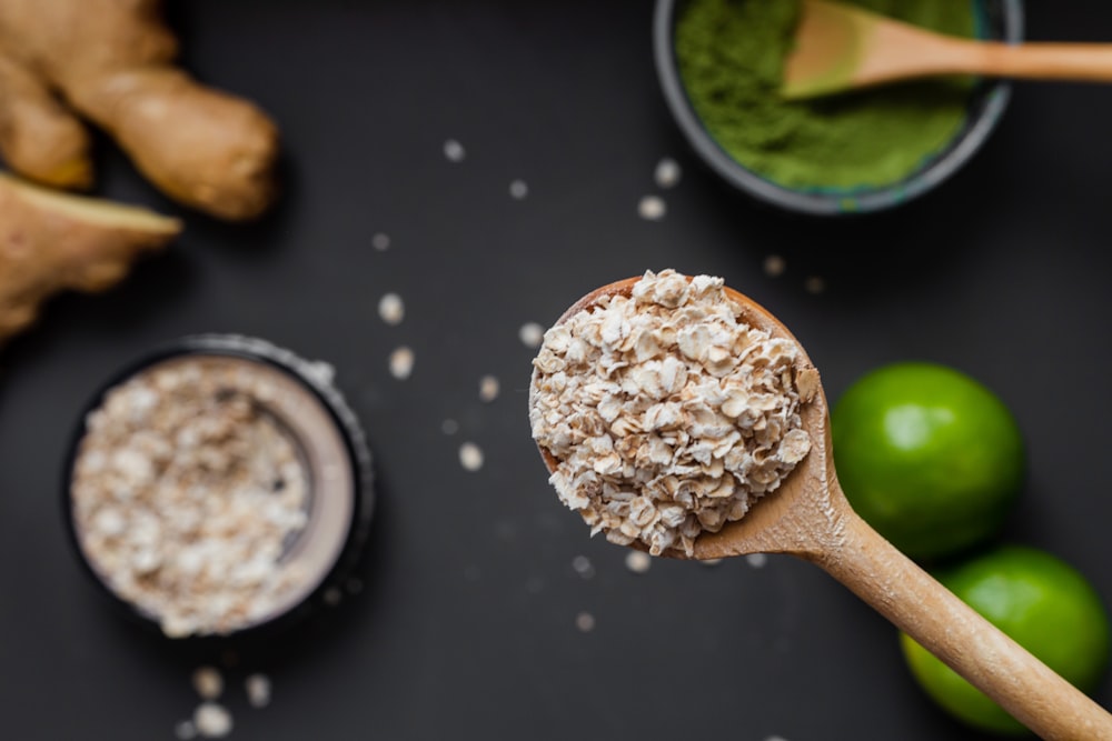 brown wooden spoon with white powder