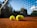 yellow tennis ball on brown sand