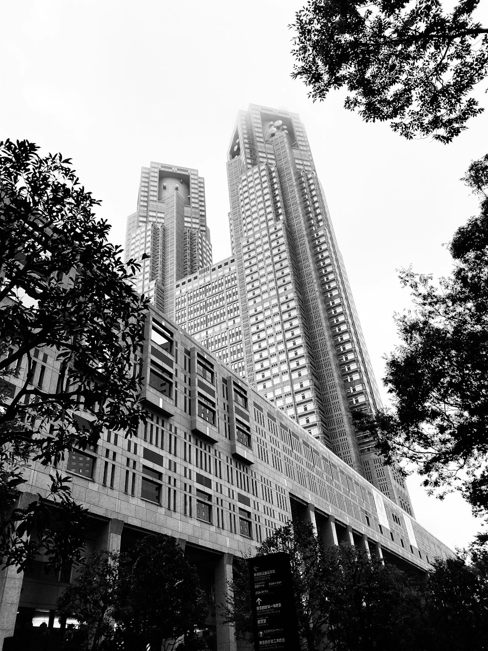 grayscale photo of high rise building