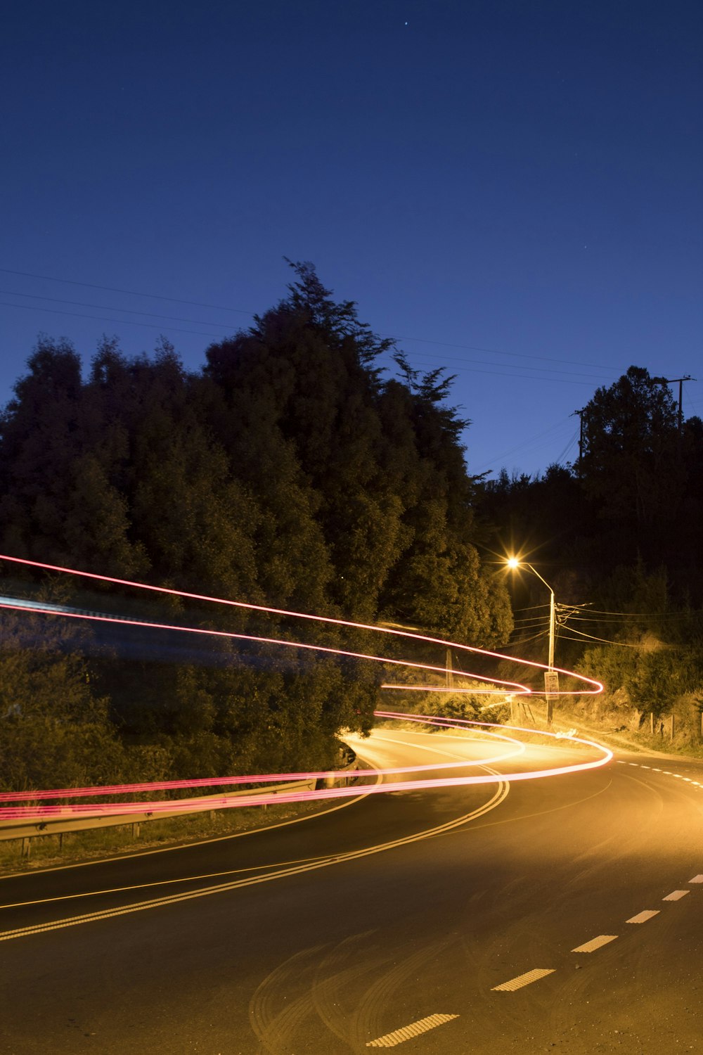 time lapse photography of cars on road during night time