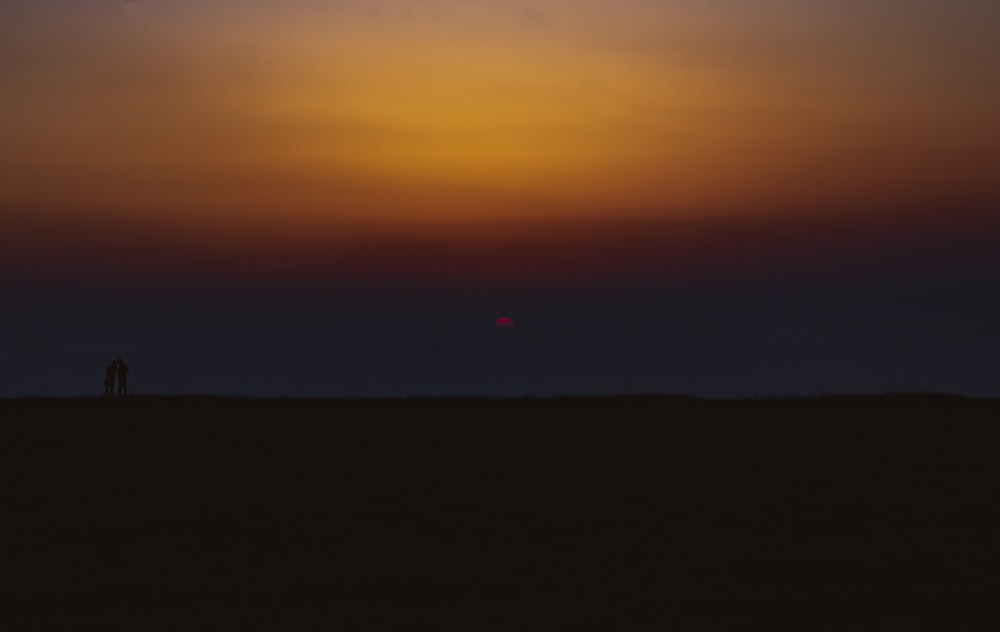 silhouette of mountain during sunset