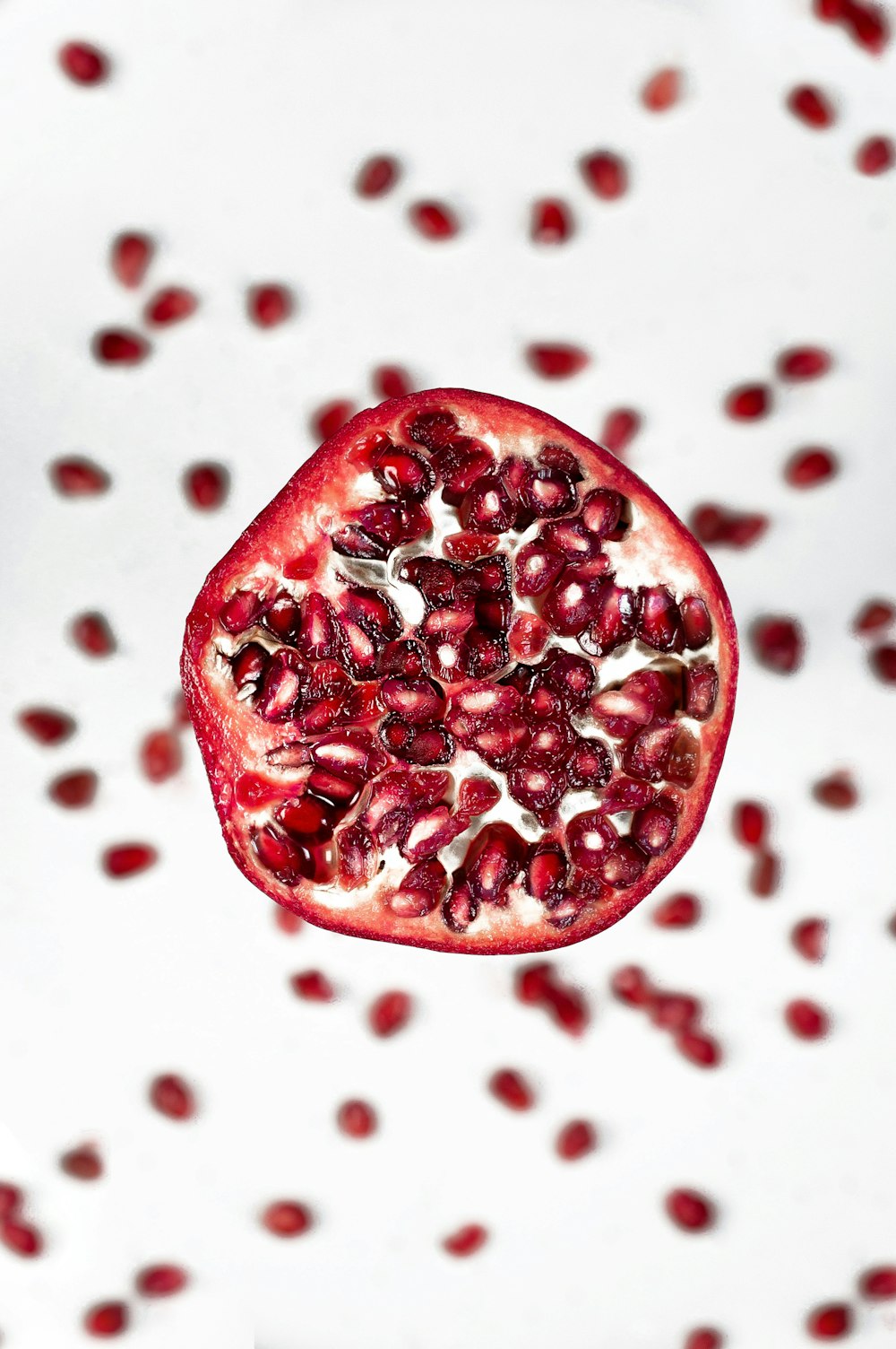 red heart shaped candies on white surface