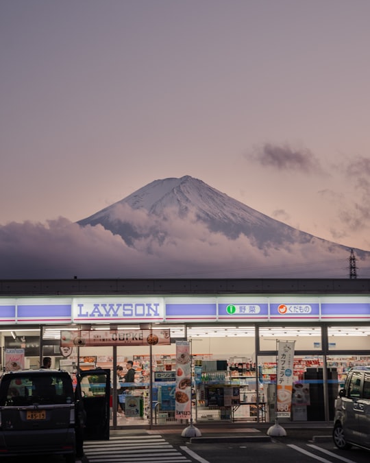 white and brown mountain under white clouds during daytime in Mount Fuji Japan