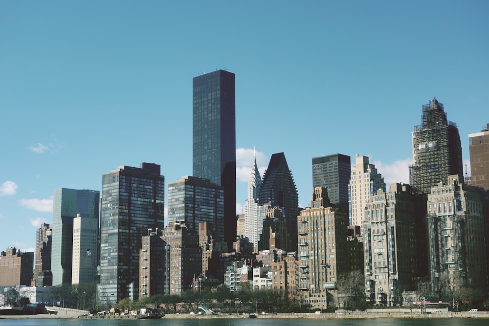 city buildings under blue sky during daytime