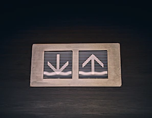 A minimalistic arrow icon indicating content can be collapsed back up