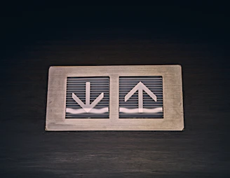 A minimalistic arrow icon indicating content can be collapsed back up