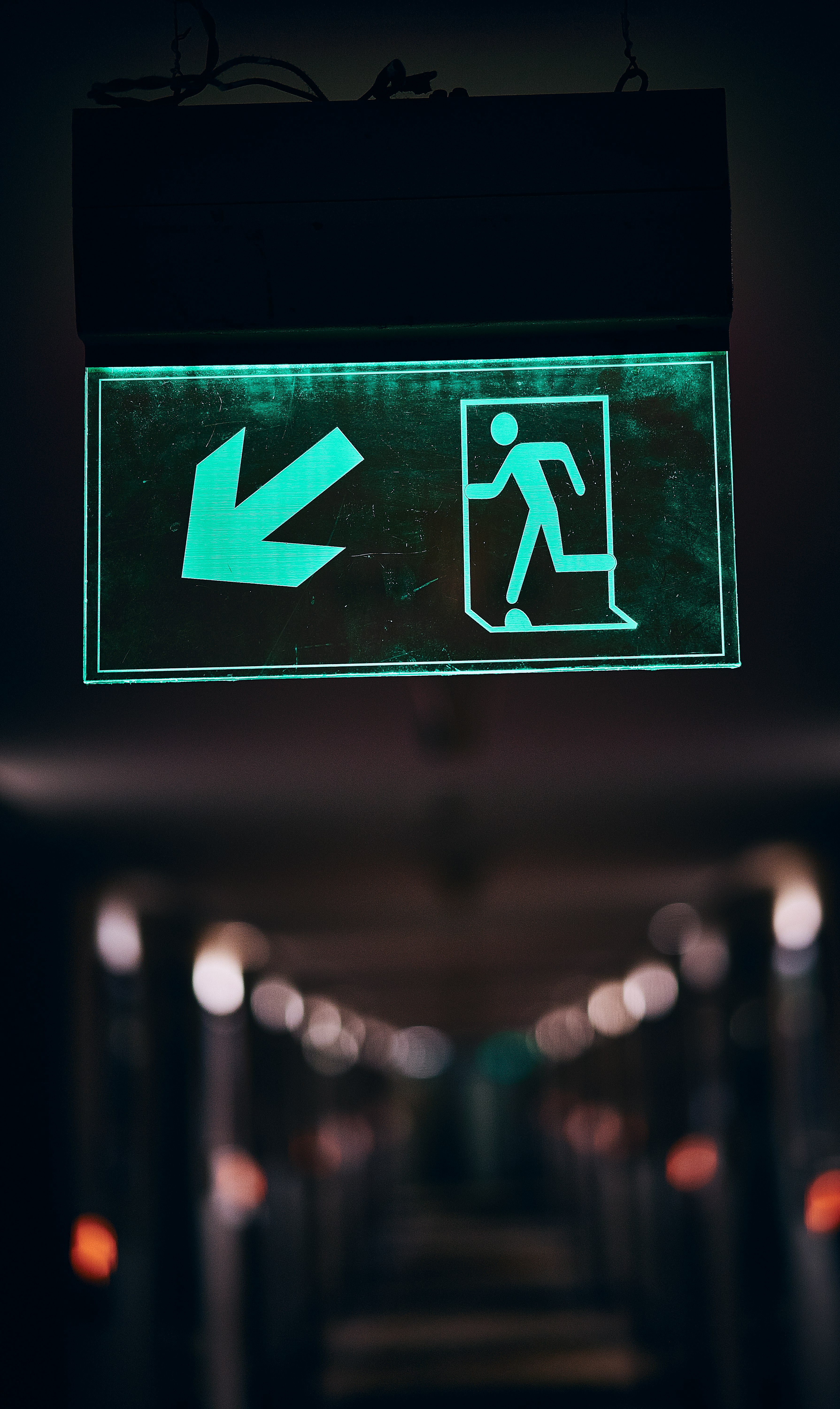 green and white pedestrian sign