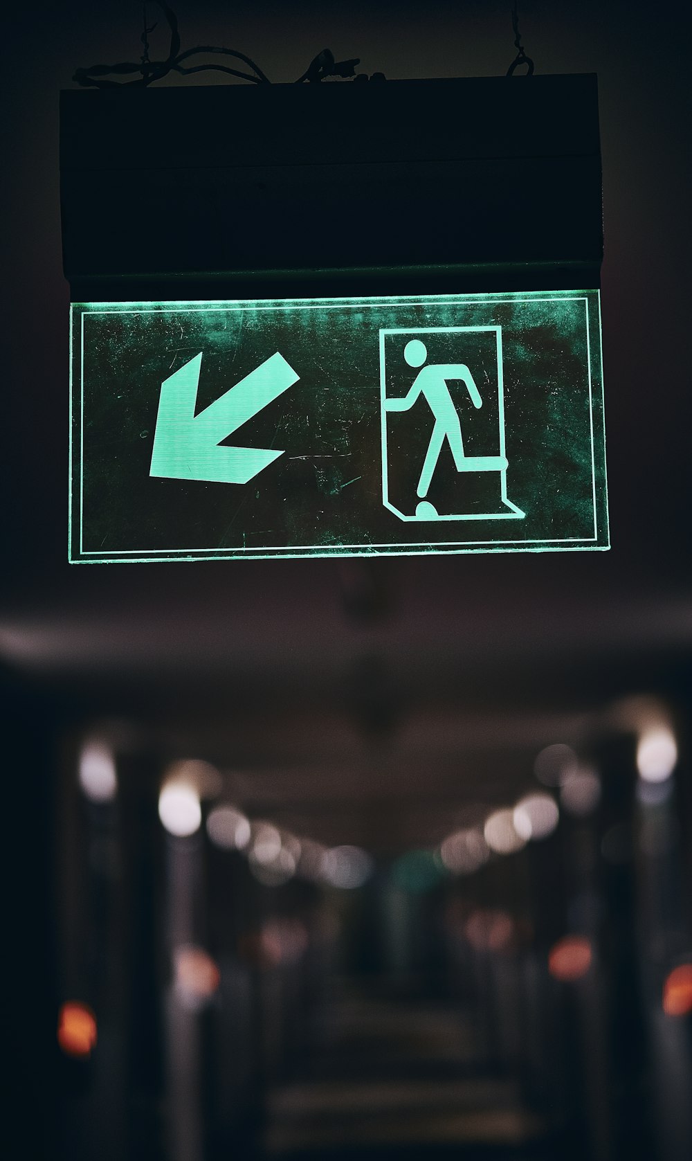 green and white pedestrian sign