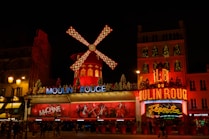 red and yellow lighted building during nighttime