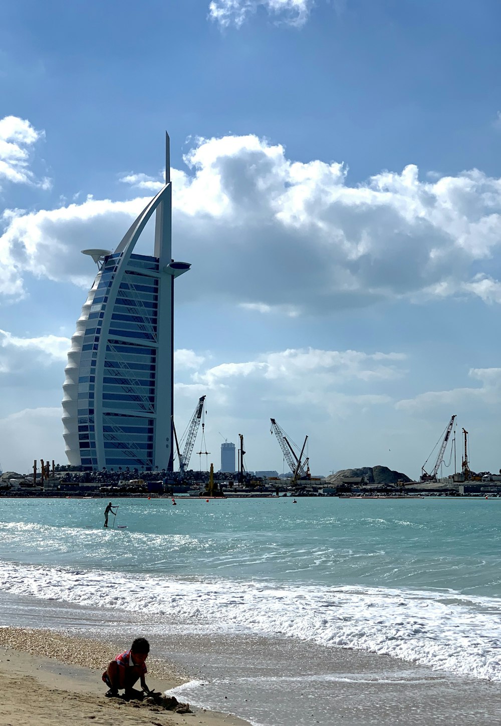 white sail boat on sea during daytime