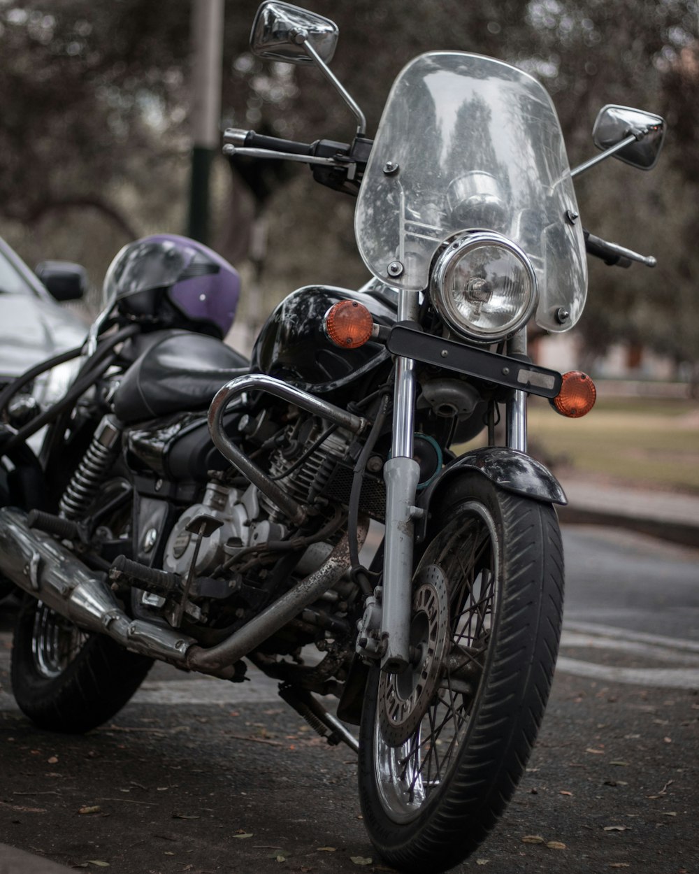 black and silver motorcycle on road during daytime