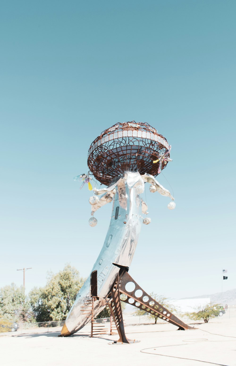 blue and white ferris wheel under blue sky during daytime