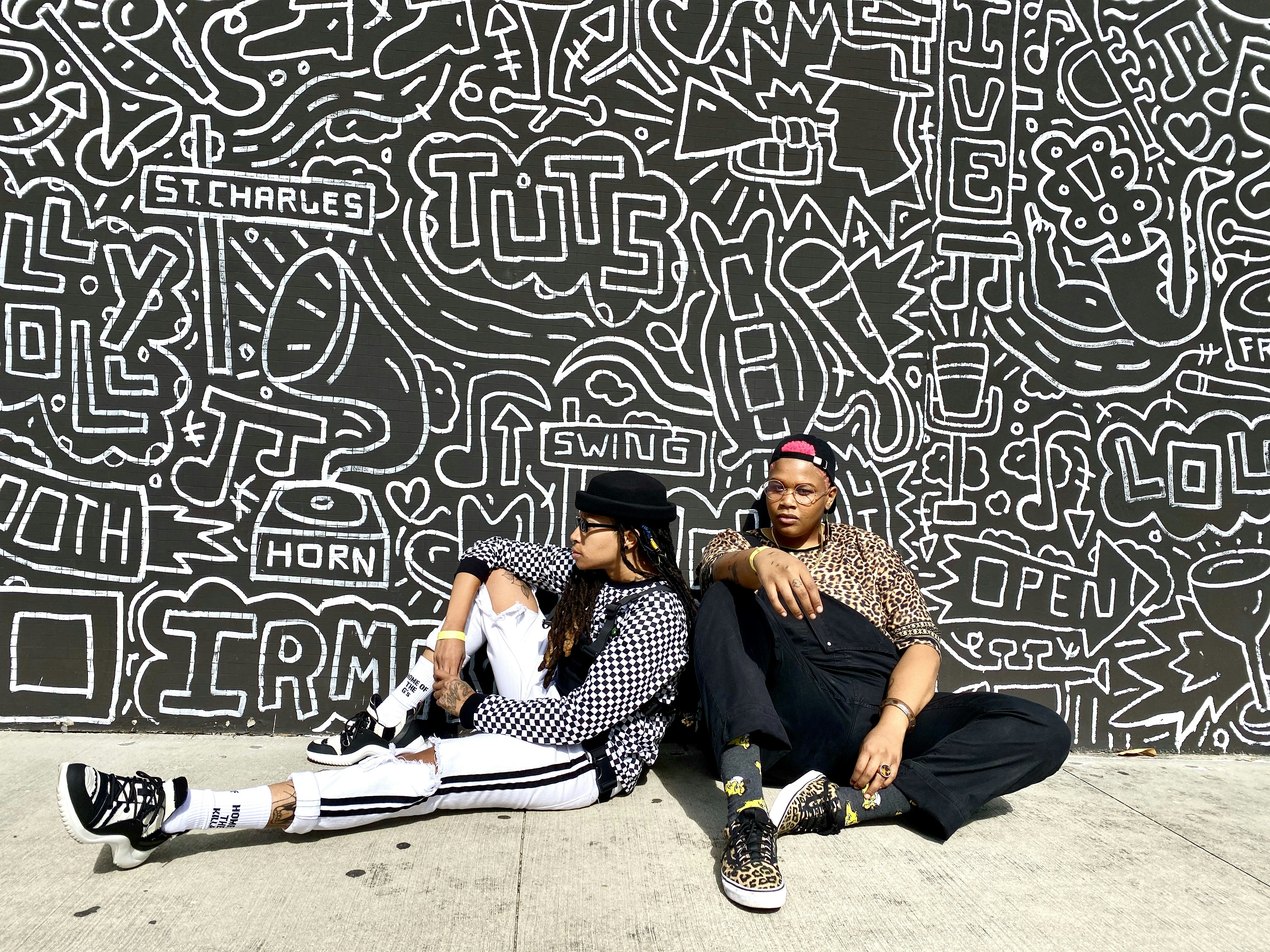 Two friends creating art together