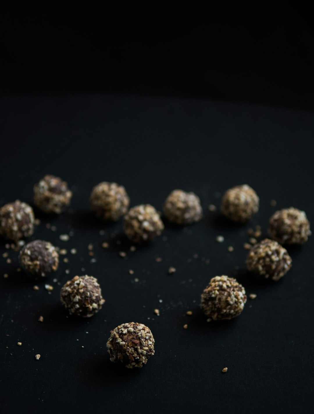 black round fruits on black surface