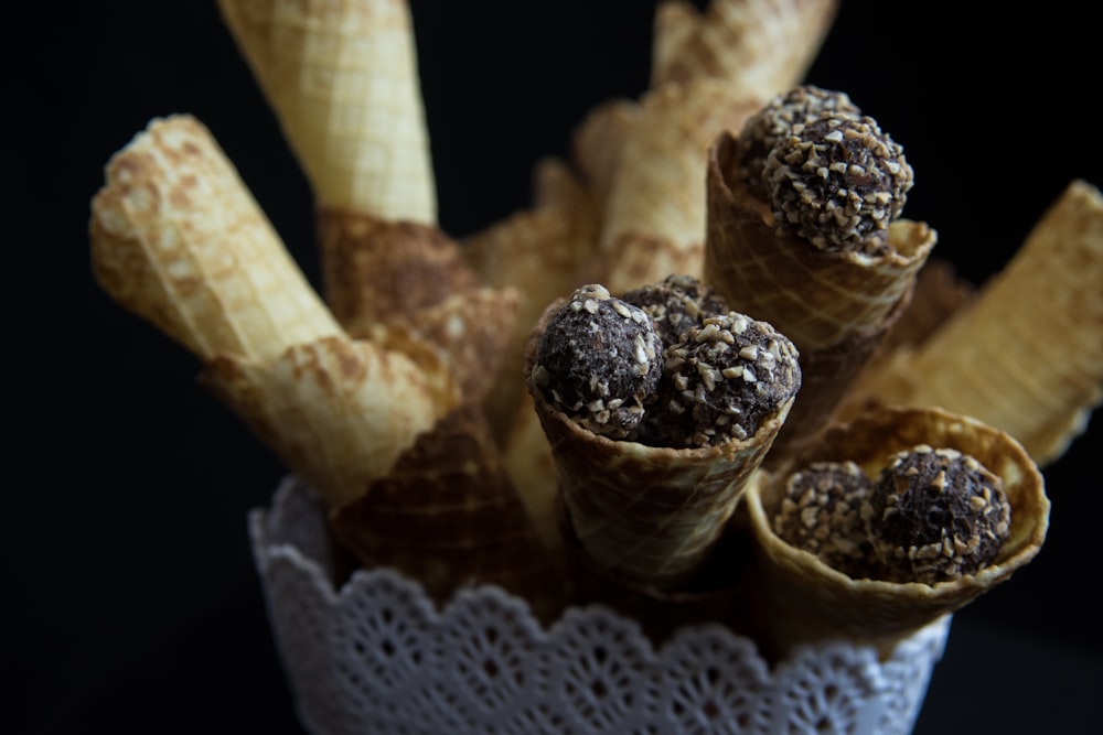 black round fruit on brown wooden stick