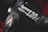 Close-up view of a professional studio light labeled 'Aputure 120d II' with a black cylindrical body and control knob featuring a logo.