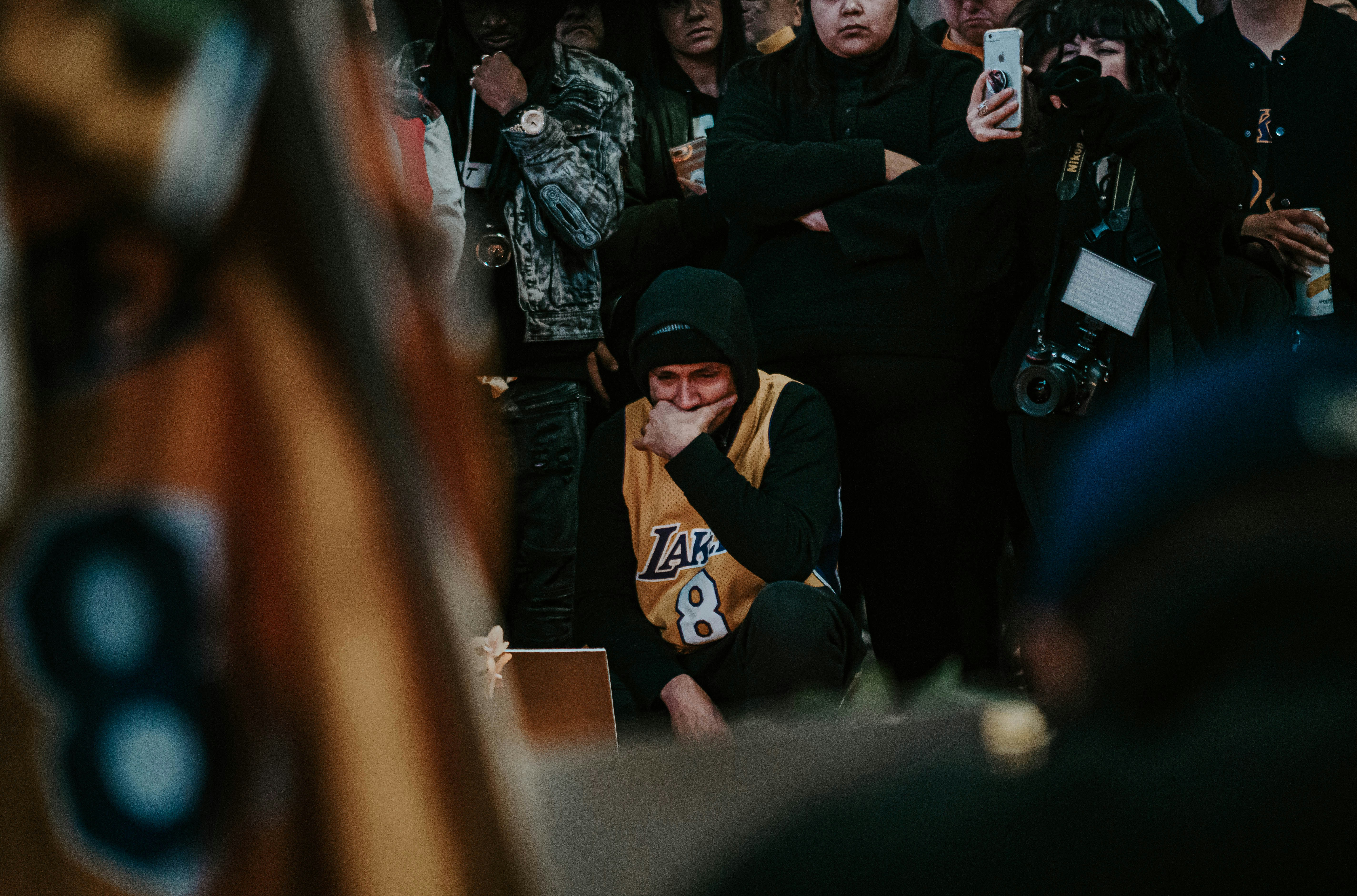 Fan's mourn Kobe Bryant's death at a vigil at Staples Center on January 26th, 2020.