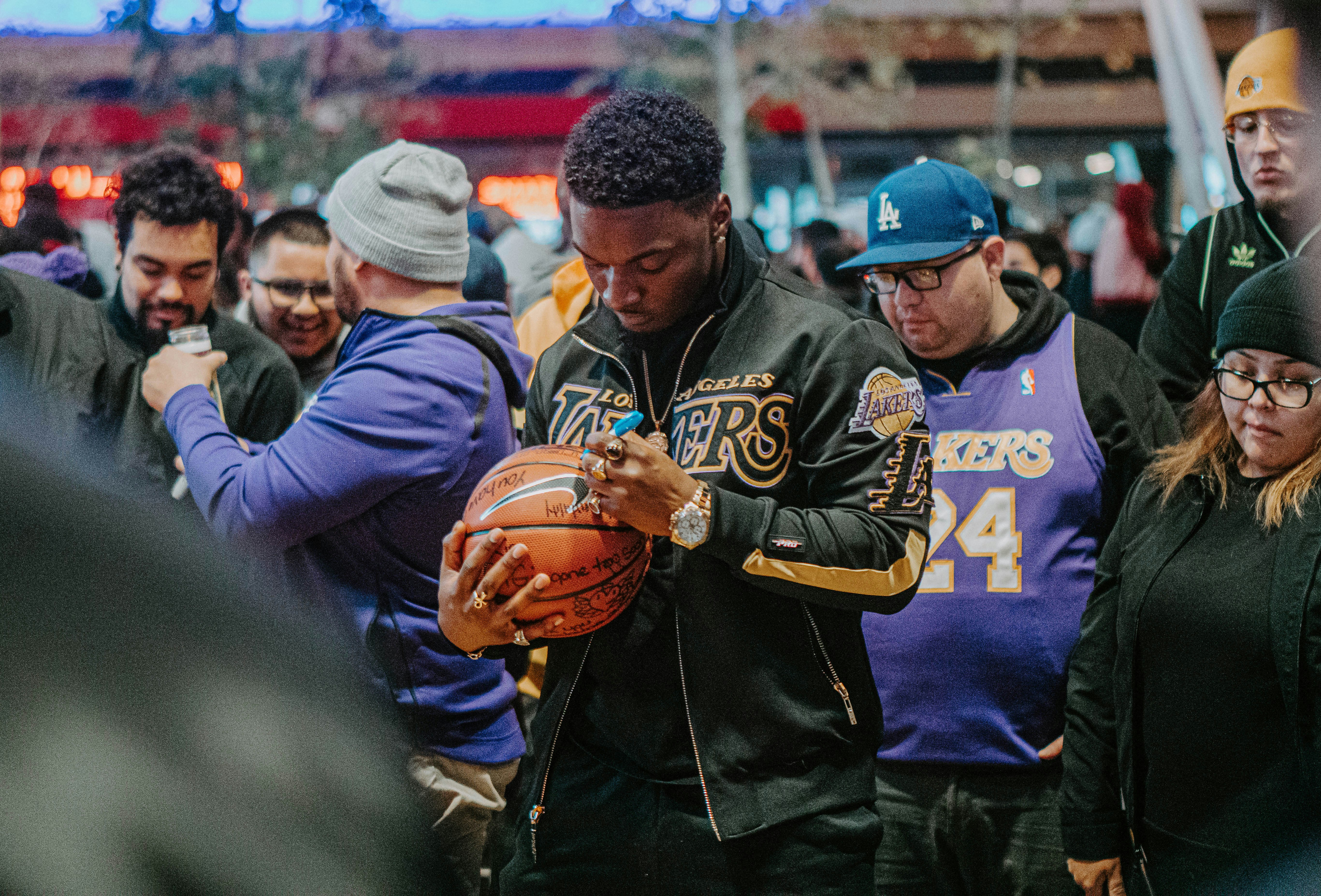 Fan's mourn Kobe Bryant's death at a vigil at Staples Center on January 26th, 2020.