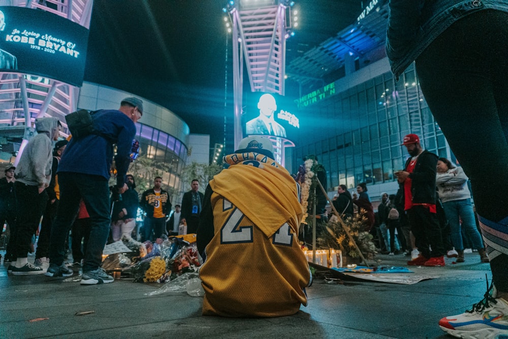 people walking on street during nighttime