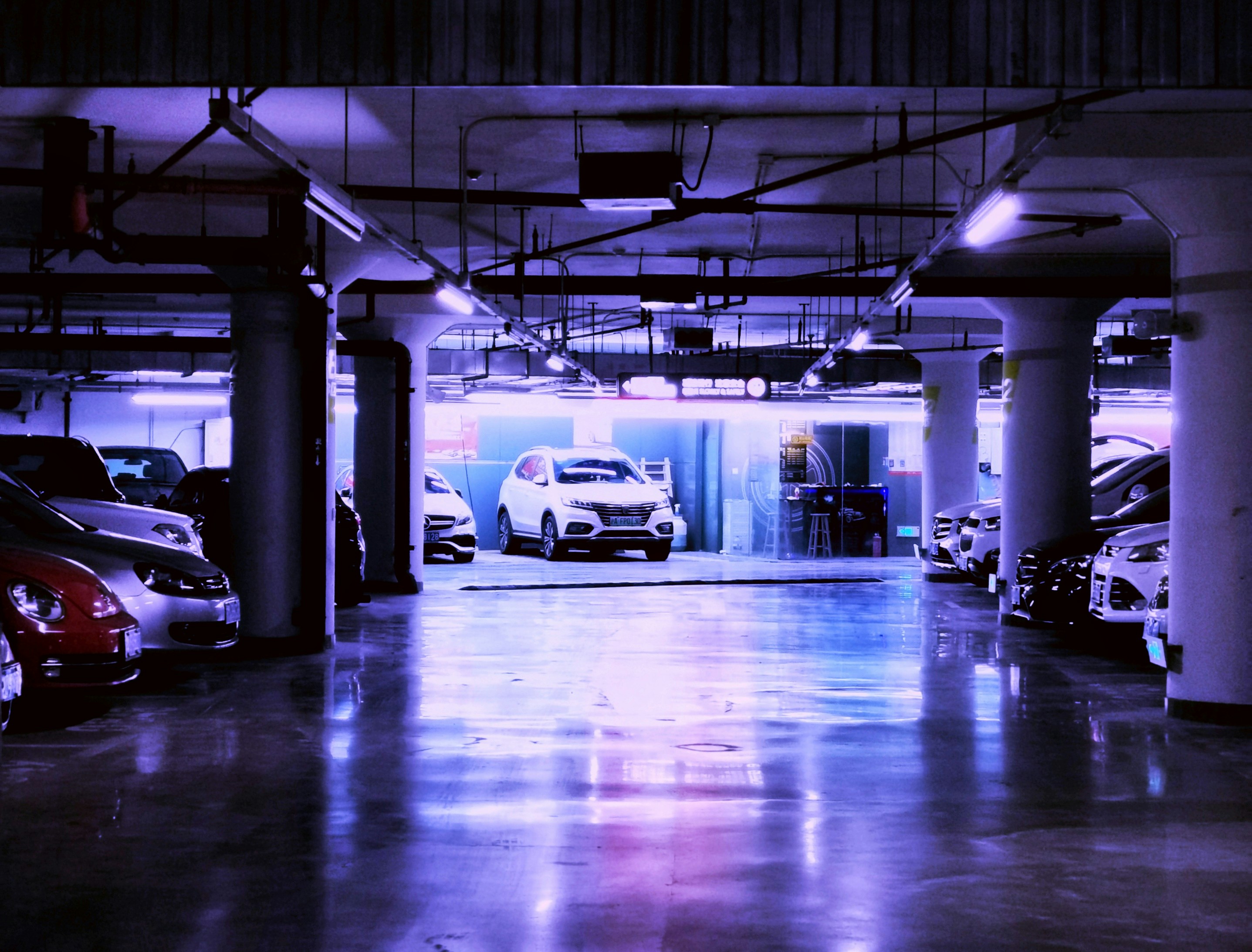 Row of used SUVs parked on a dealership lot