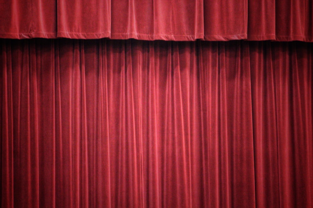 red curtain on white wall