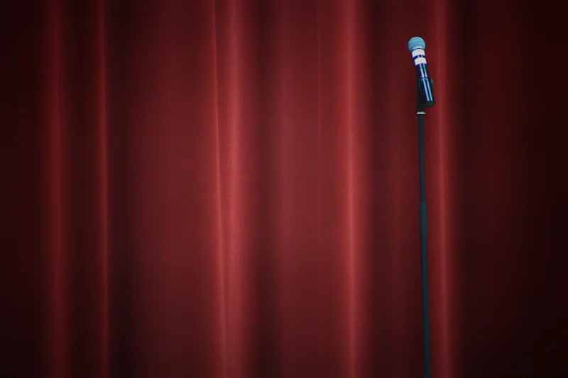 Microphone on stage under spotlight