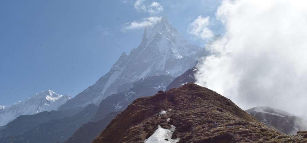 brown and white mountain under blue sky during daytime