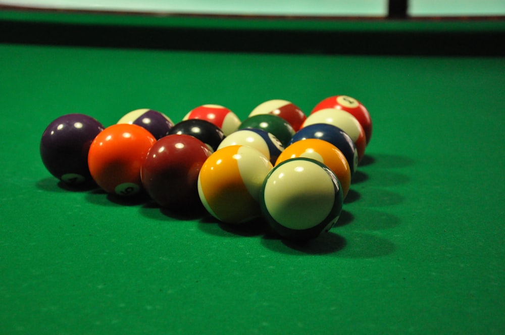 billiard balls on billiard table