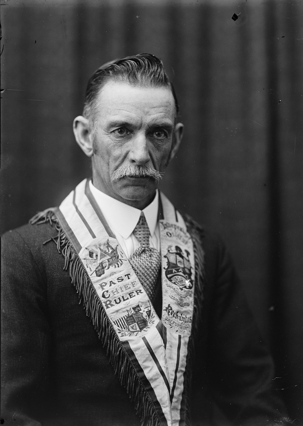 man in black suit jacket