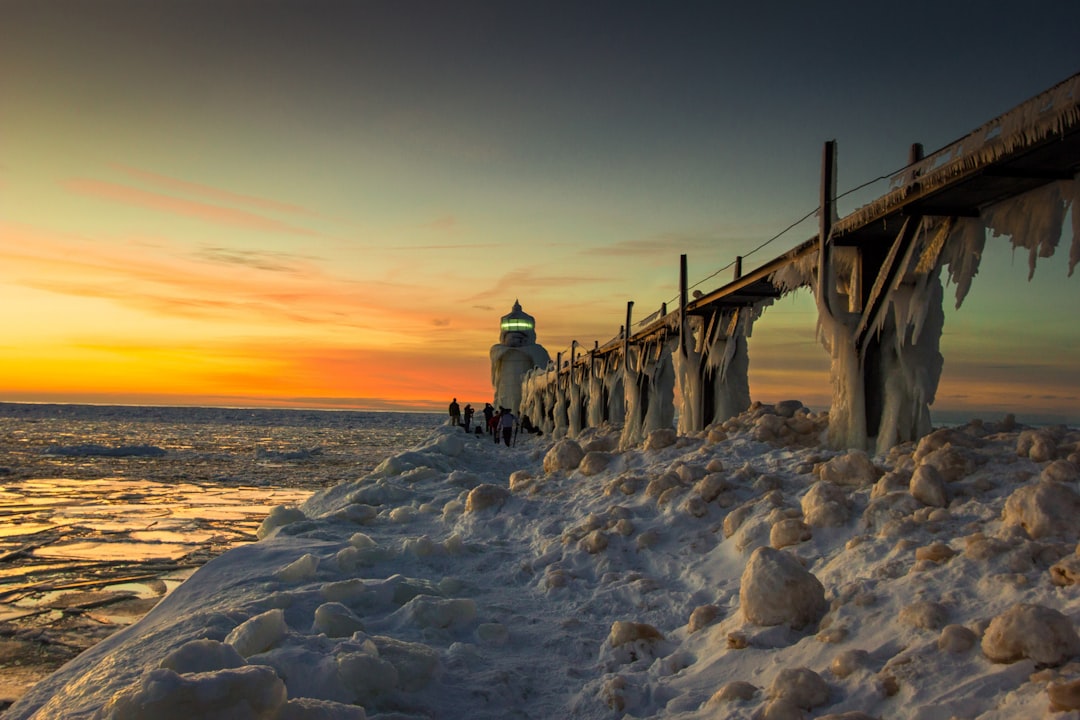 brown wooden dock on sea during daytime