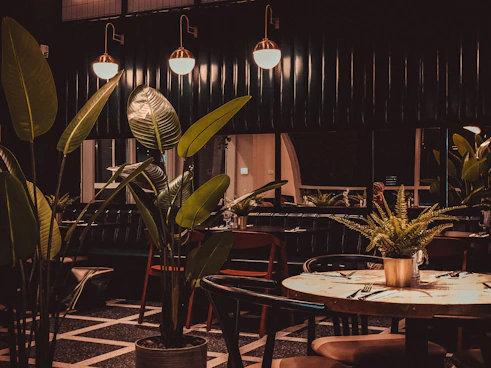 brown wooden table with chairs