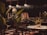 A dimly lit restaurant interior featuring large leafy plants and a wooden table set for dining. The ambiance is warm with copper pendant lights hanging above, casting a soft glow. Dark walls and flooring contribute to a cozy, intimate atmosphere.