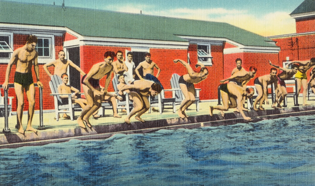 group of people sitting on brown wooden bench, $50,000, swimming pool, Cushing General Hospital, Framingham, Mass.<p></figure>Date:</p><p>[ca. 1930–1945]</p><p>https://ark.digitalcommonwealth.org/ark:/50959/6d570045v</p><p>Please visit Digital Commonwealth to view more images: https://www.digitalcommonwealth.org.</p><p>